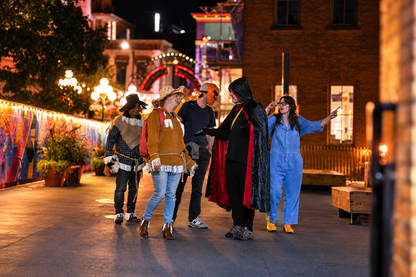 Costumed guests in Market Square on Halloween Pub Crawl